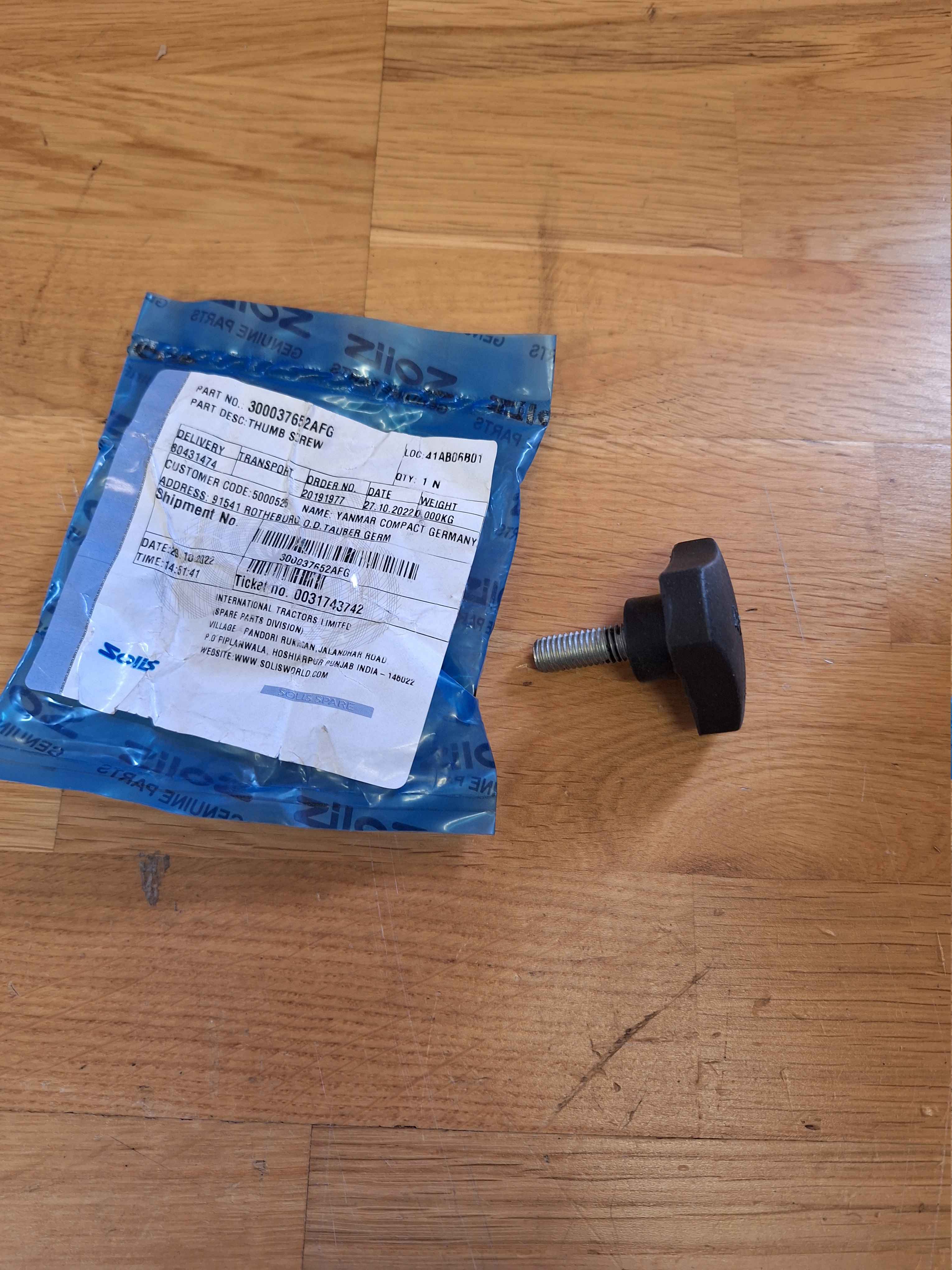 Skruv med plastknopp