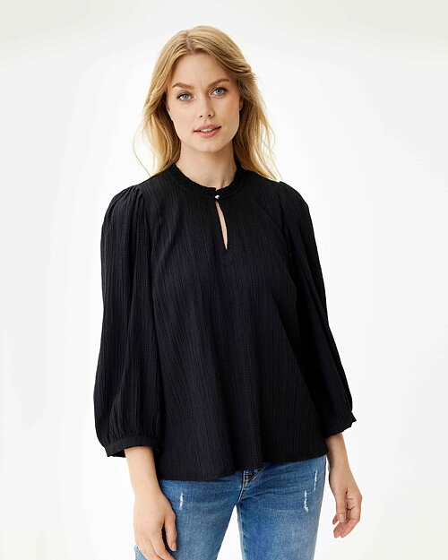 Blus Tove svart med puffärm