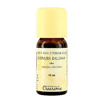 En liten brun glasflaska med gul etikett och gul plastkork. På etiketten står Copaiba Balsam Eko 10 ml.
