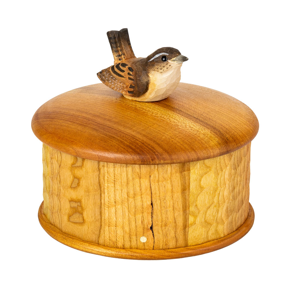 Wooden Box Wren shown from a high angled view, focusing on the wren and the rounded lid.
