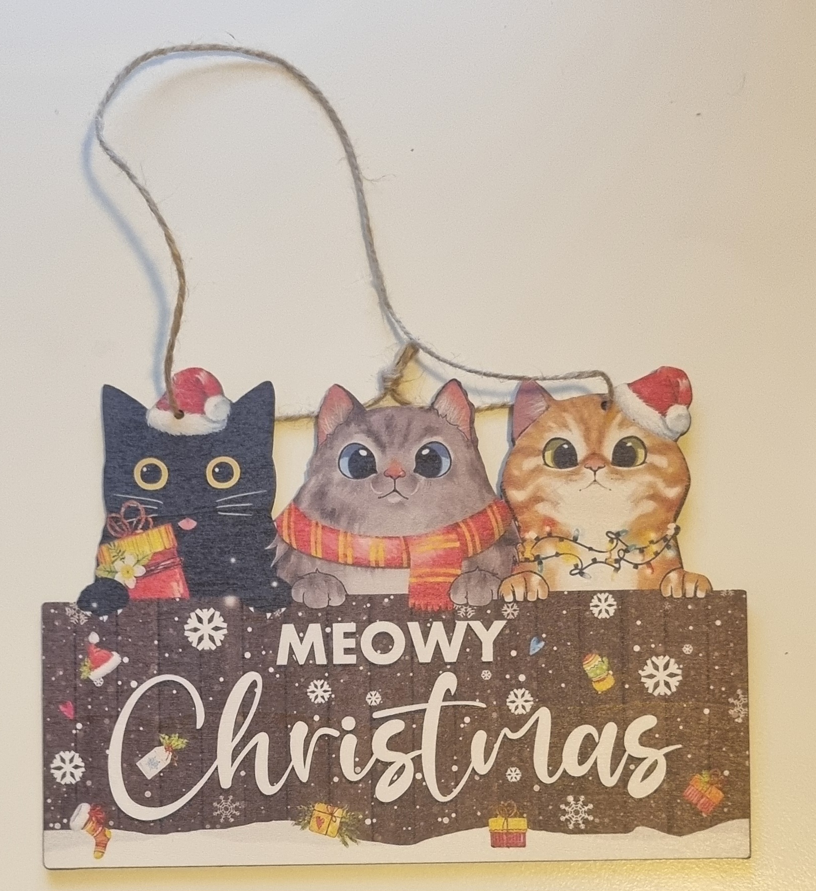 Skylt i träfaner "Meowy christmas"
