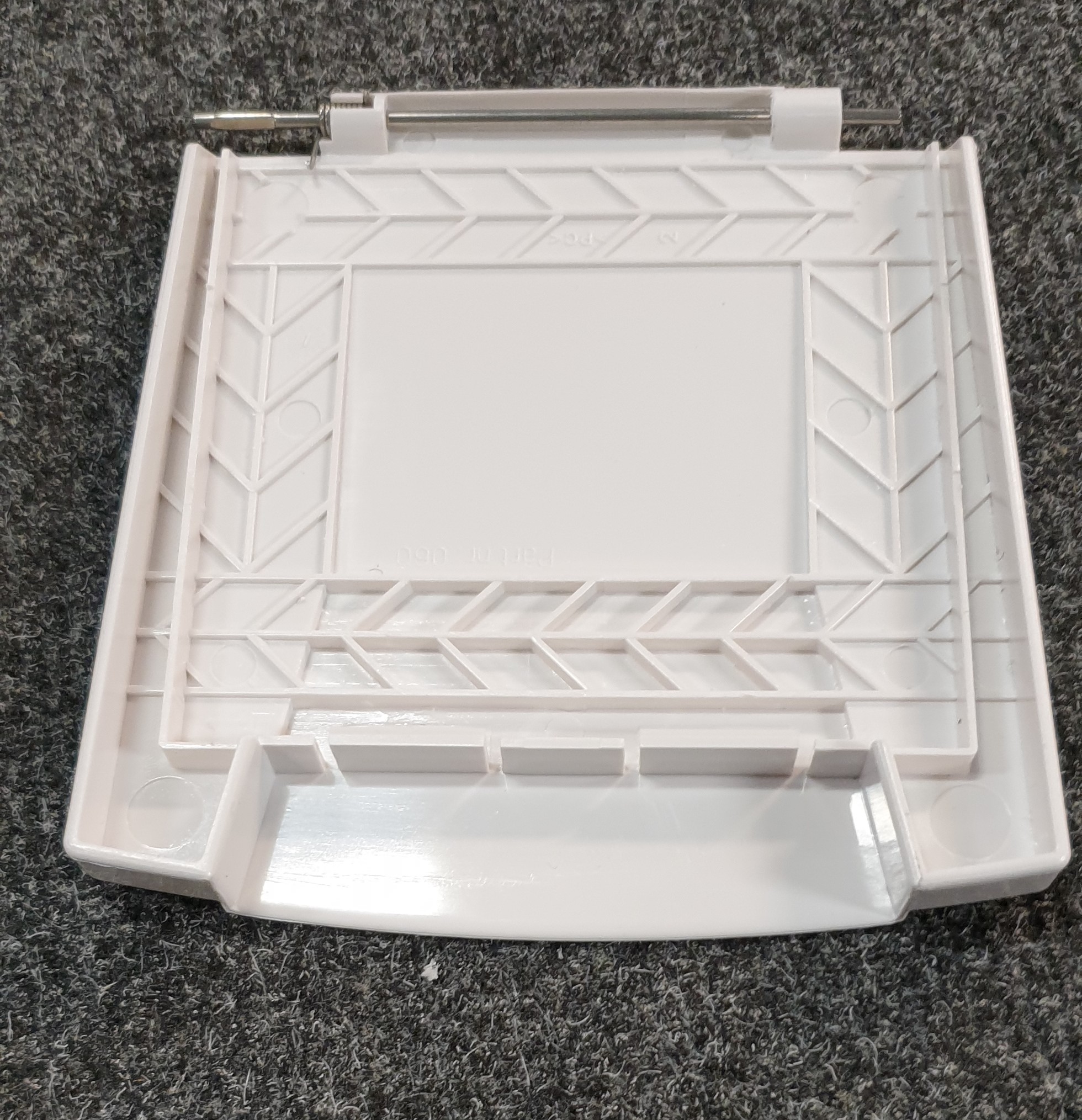 Outer white hatch, complete with metal stick