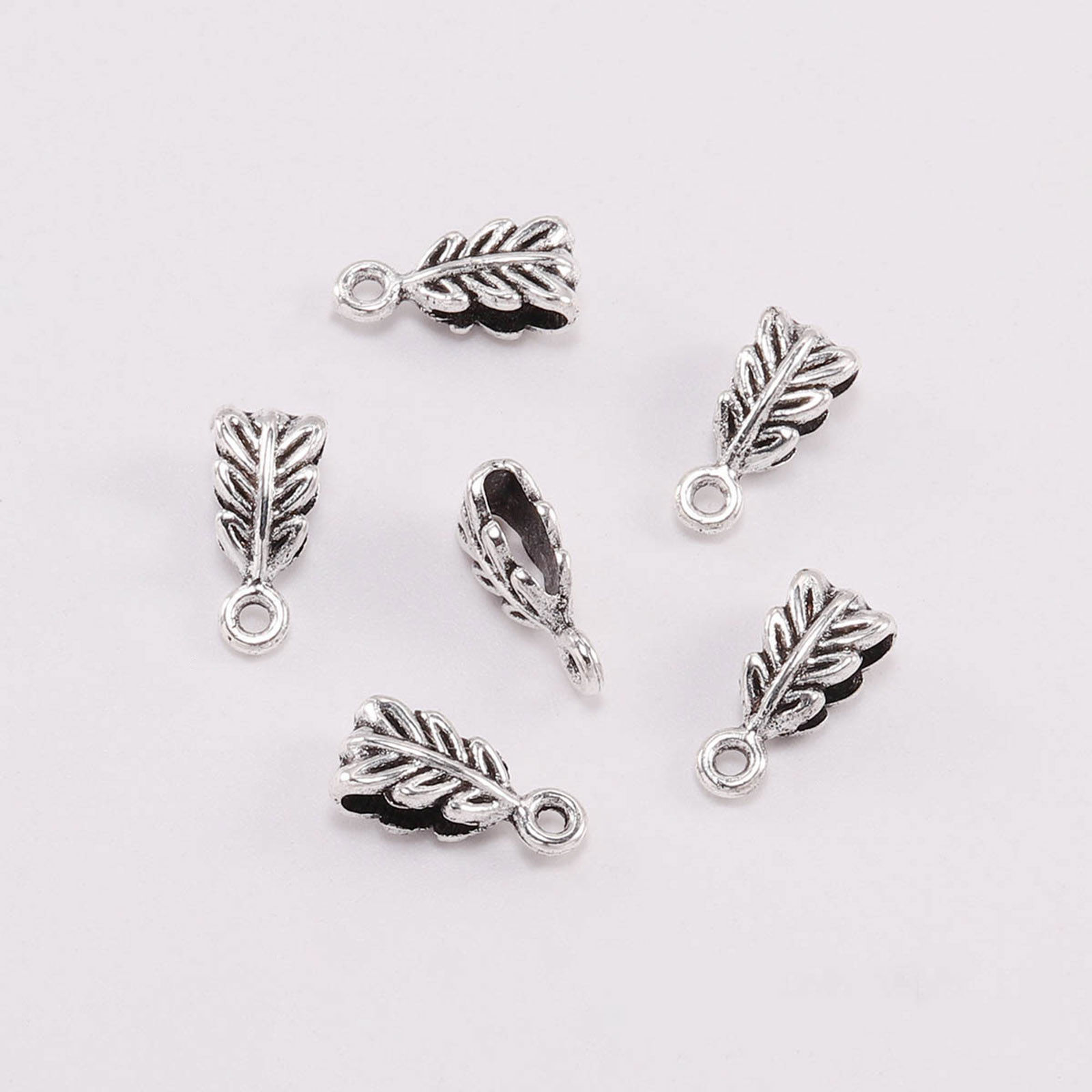 Connector / bail in silvermetal, patterned Leaf