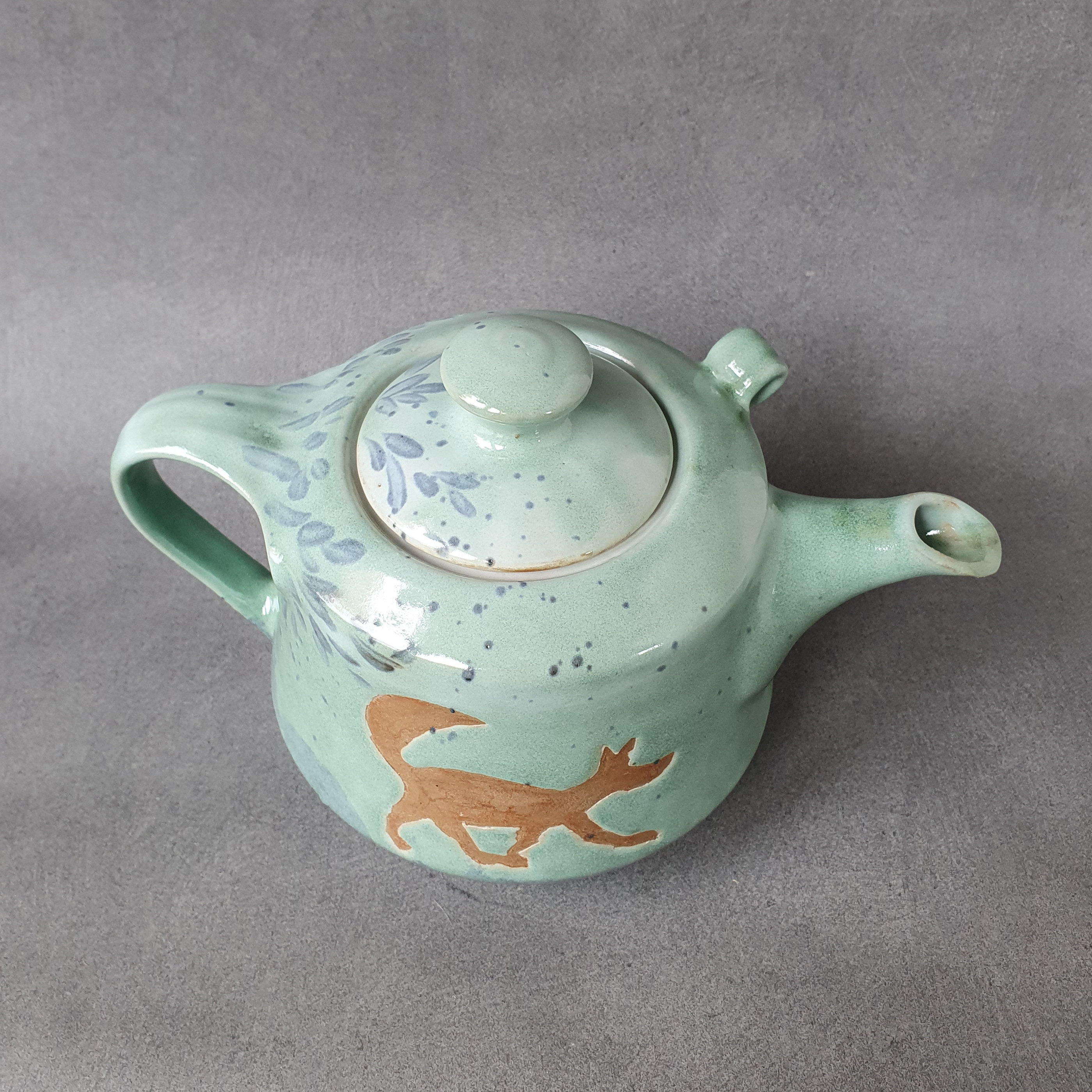 Teapot forest with hares and fox - 3