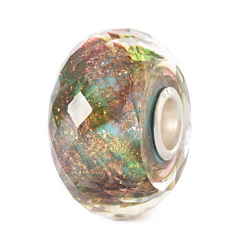 Gentle Care – en facetterad Trollbeads-glaspärla i grönt, rosé och guld som strålar av stillhet och värme.