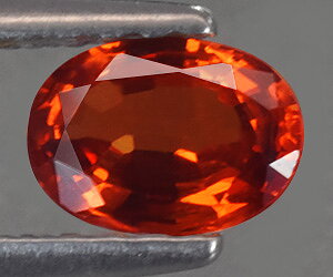 Gema de granate espesartina natural genuina de 0,54 ct, impresionante y de la más alta calidad.