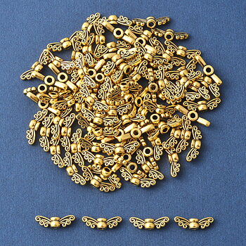 Metallpärlor – Fevingar antikguld 14 mm (10 st)
