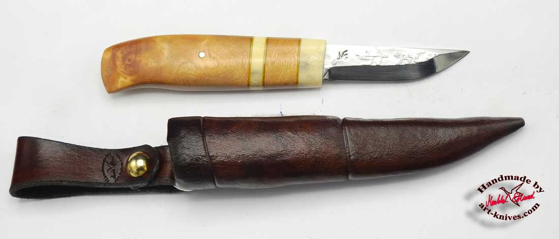 Knife 645 petroglyph