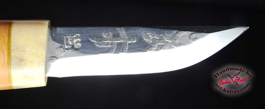 Knife 645 petroglyph - 2