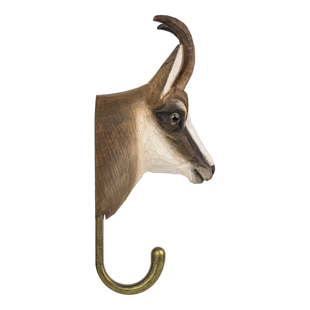 Hand-carved Hook Chamois in side view showing the straight horn and carved head profile.
