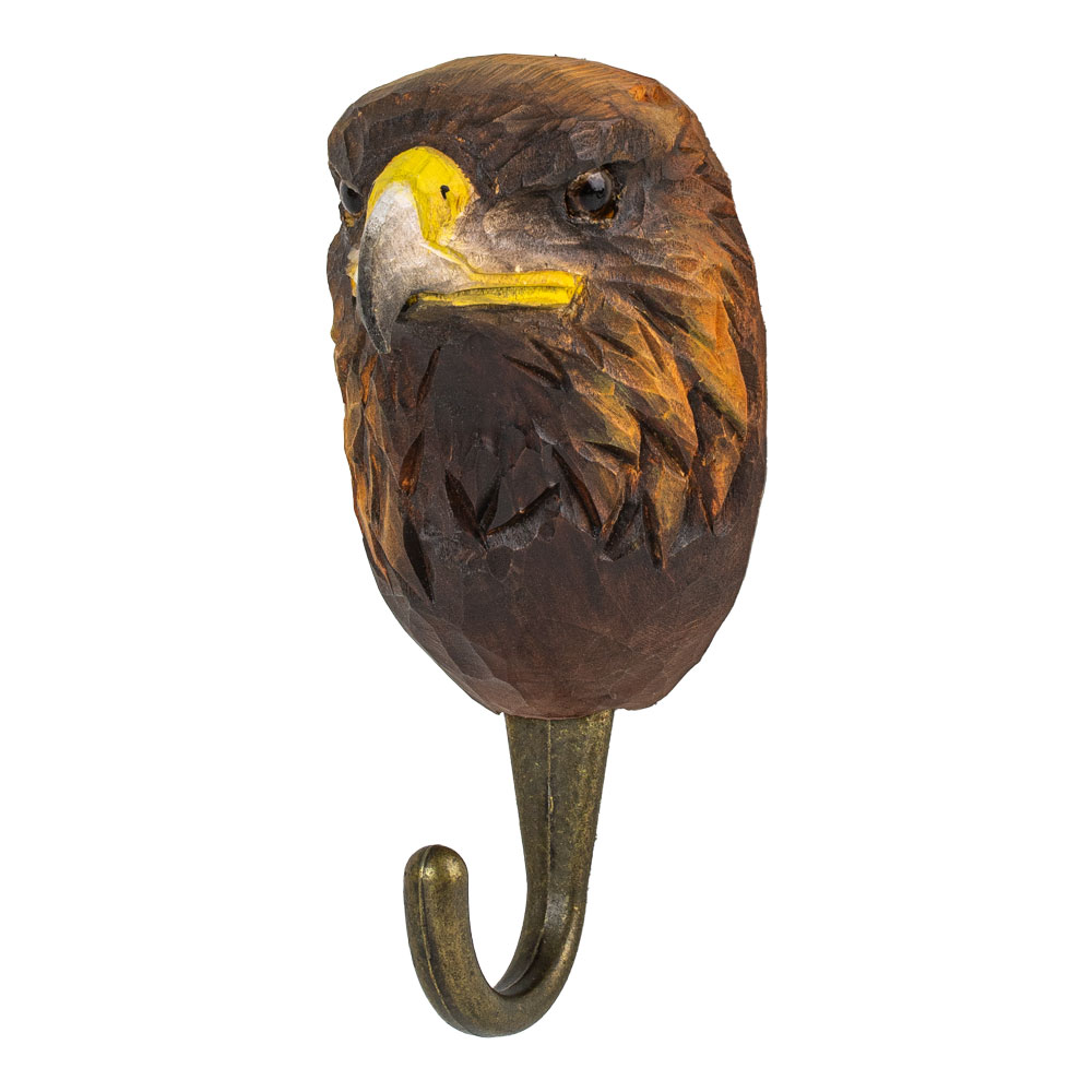 Patère Aigle royal en bois sculpté vue en angle, montrant les détails du bec et du plumage.