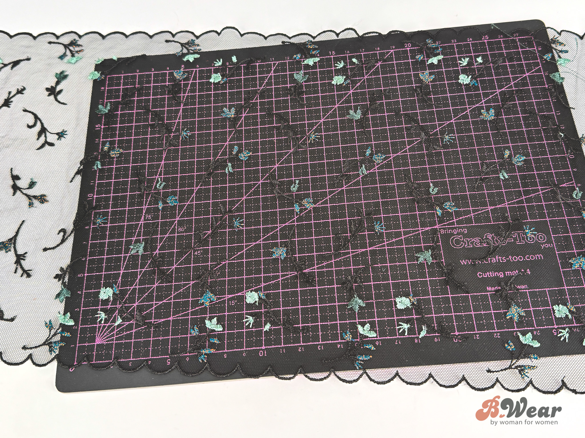 Beautiful non stretch lace in black with teal and copper details - 23 cm - 2