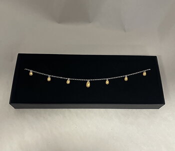 Silverhalsband med guldförgyllda löv