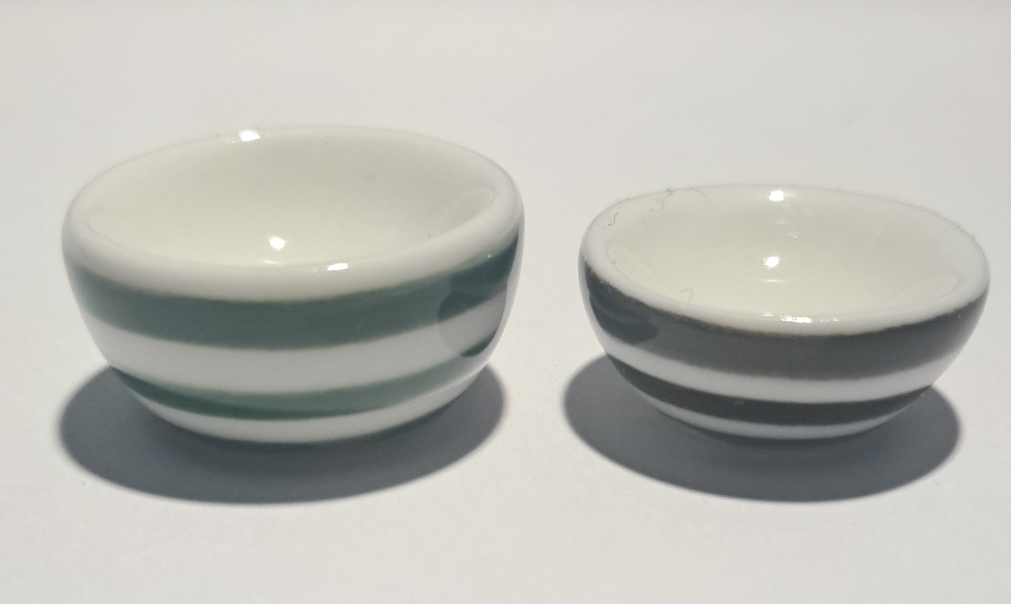 two blue-rimmed bowls