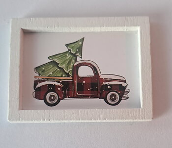 Board with truck and fir tree