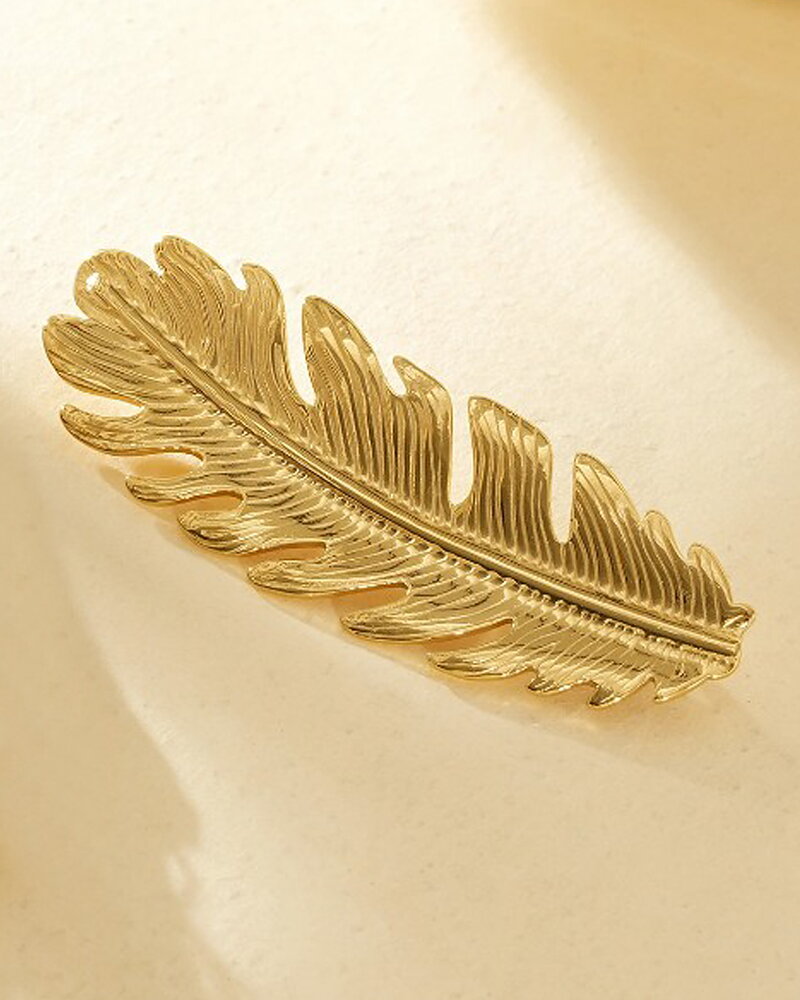 Brosch fjäder guld