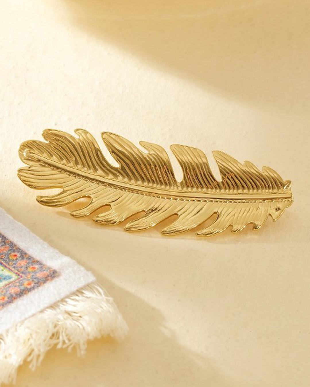 Brosch fjäder guld - 2