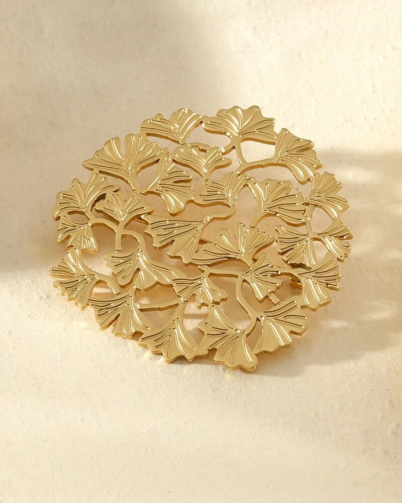 Brosch små ginkolöv guld