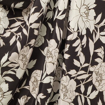 Tryckt viskos svart med blommönster