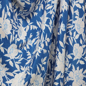 Tryckt viskos blått med blommönster
