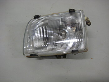 Framlampa Nissan Micra 83-92 Vänster