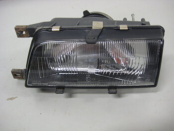 Framlampa Nissan Sunny 87-91 Vänster