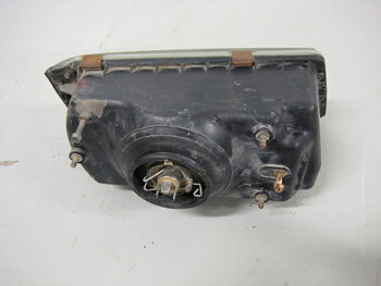 Framlampa Mitsubishi Lancer 84-88 Vänster