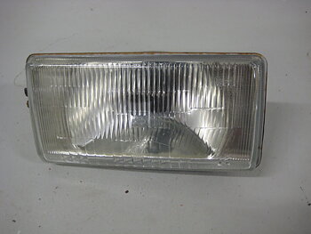 Framlampa Nissan Sunny 1983-86 B11 Vänster