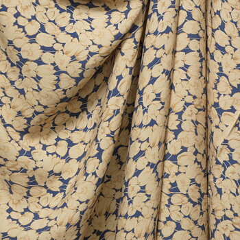 Tryckt viskos blått med beiga blommor