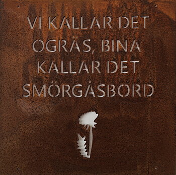 Trädgårdsskylt budskap - Vi kallar det ..