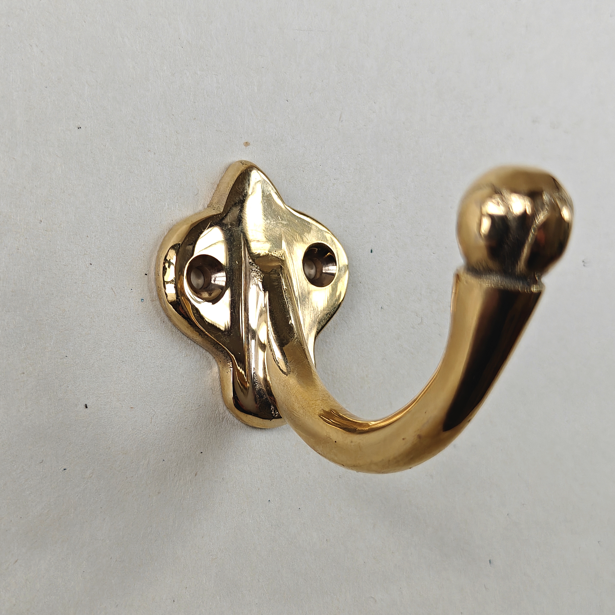 Garderobskrok mässing