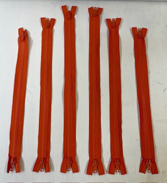 Orange dubbel dragkedja