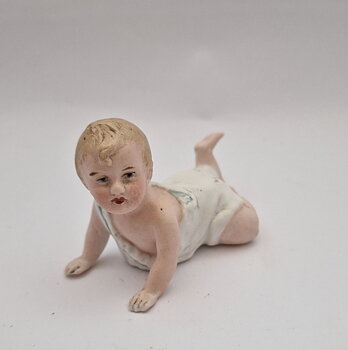Piano baby figurine