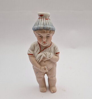 Squirter boy figurine