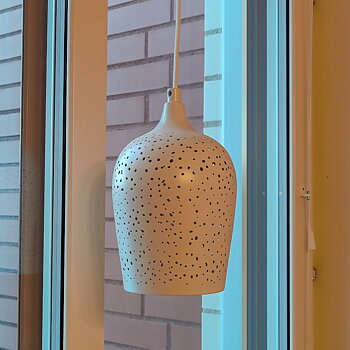 Fönsterlampa i metall