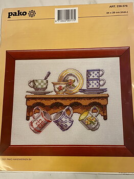 Tavla med kaffekoppar