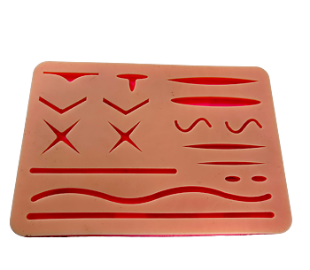 Pad for practicing suturing