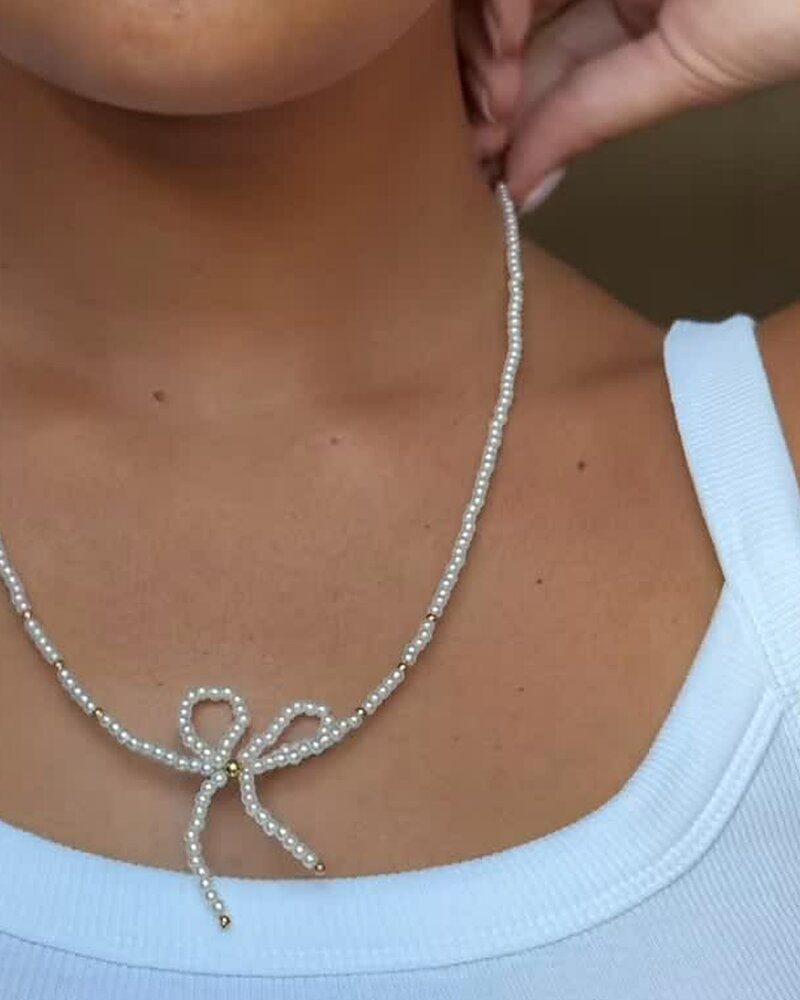 Halsband Pearl rosett med guld