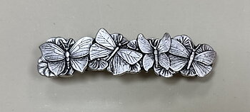 Metallklämman Fjäril i silverfärgad metall