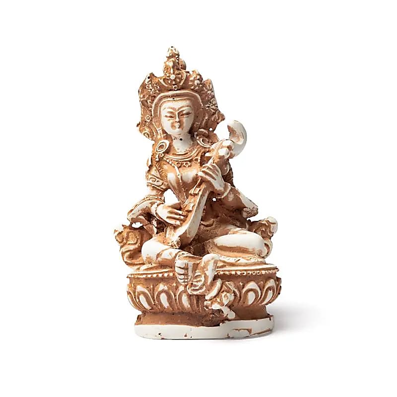 Saraswati-staty i elfenbensfärg