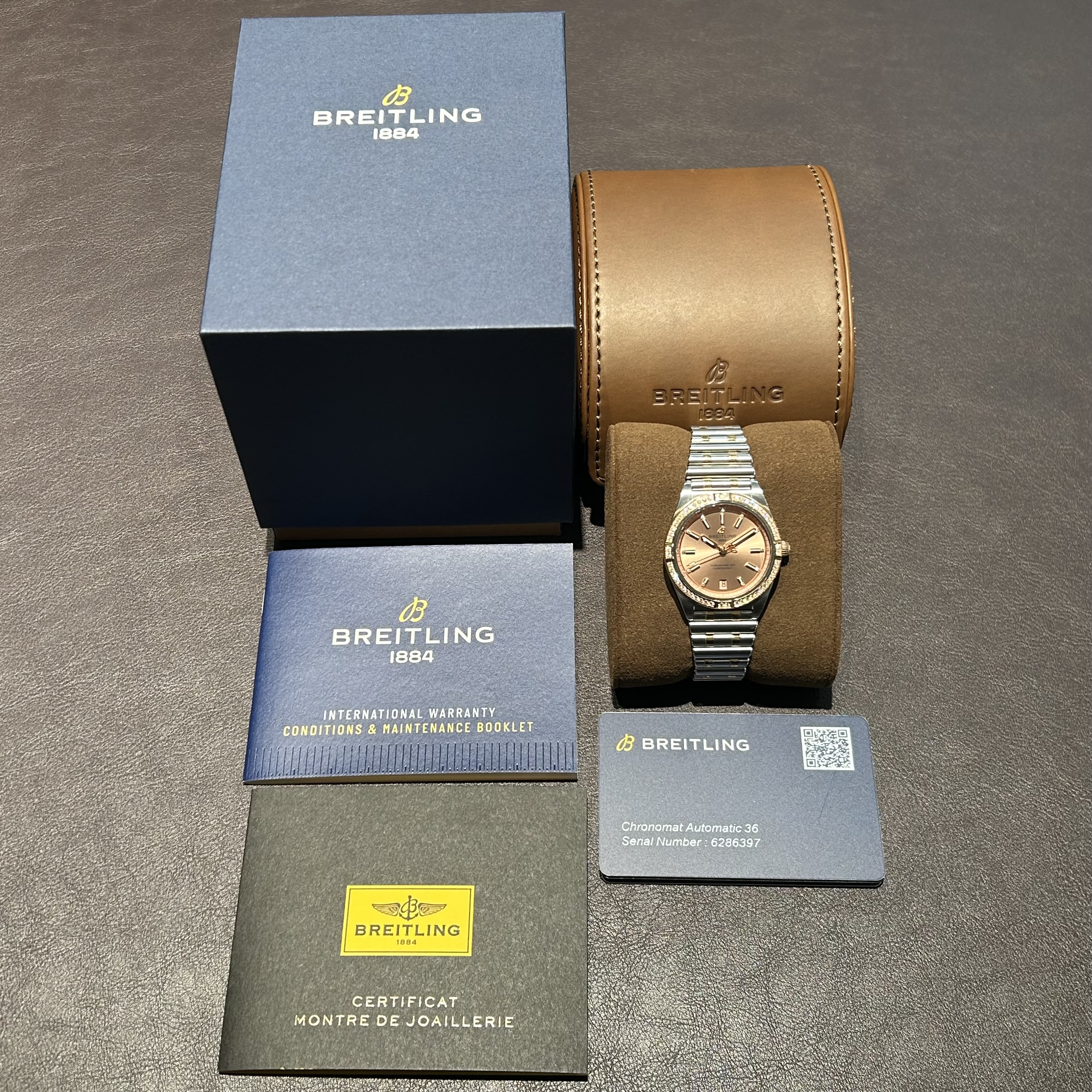 SÅLD 20 juli 2026 för 78.000:- Breitling Chronomat Automatic 36 koppar stål och 18 K rött guld med diamant bezel - 2