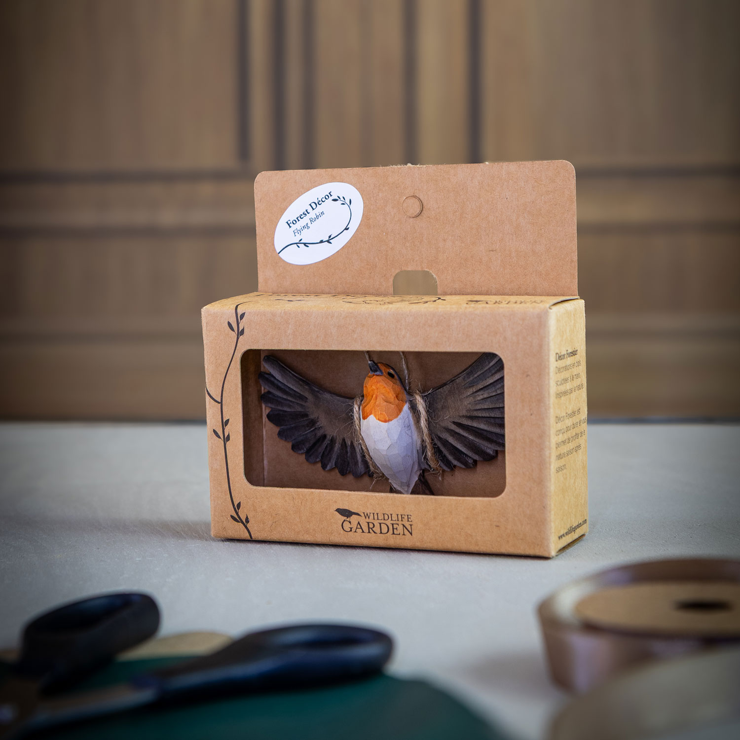 Packaging for Forest Décor – Flying Robin in a cardboard box with window.