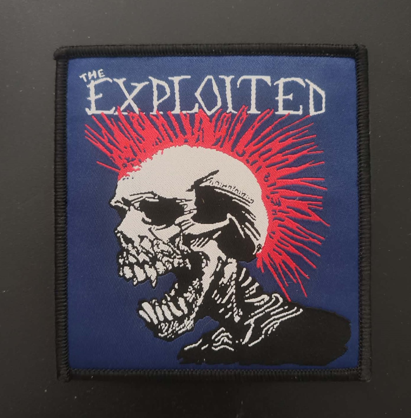 Exploited - Tygmärke