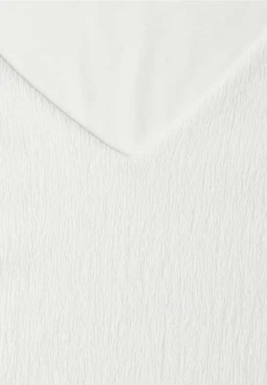 Vit v-ringad top med textur