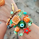 Armband med orange fyrkantig pärla