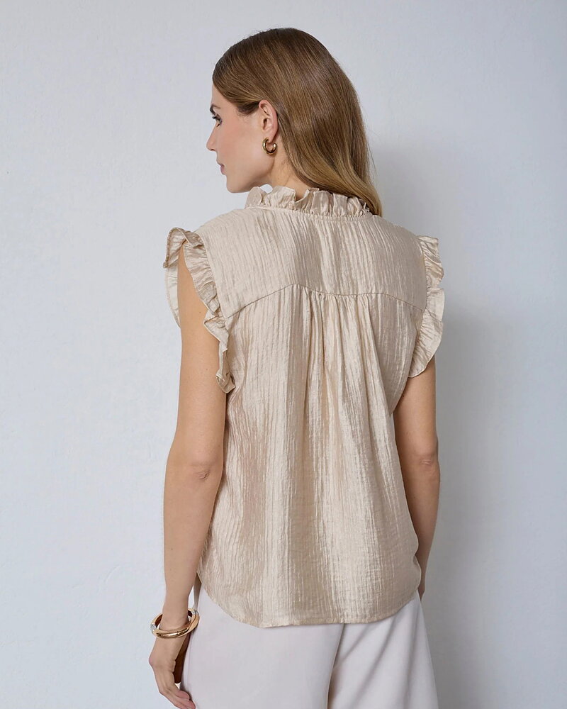 Blus Tassy frill utan ärm volang ljusbeige