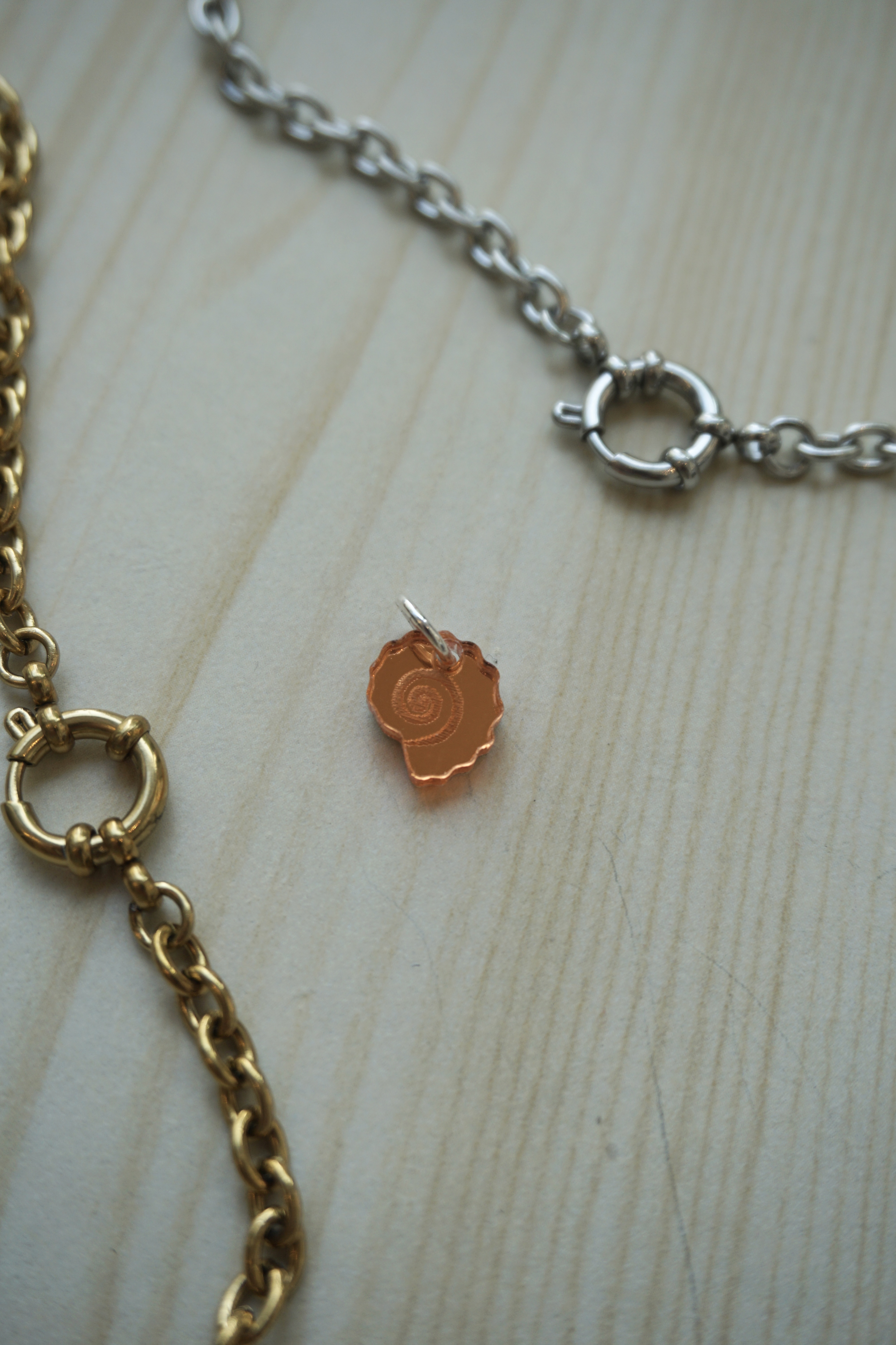 Mini berlock spegelpeach spiralsnäcka