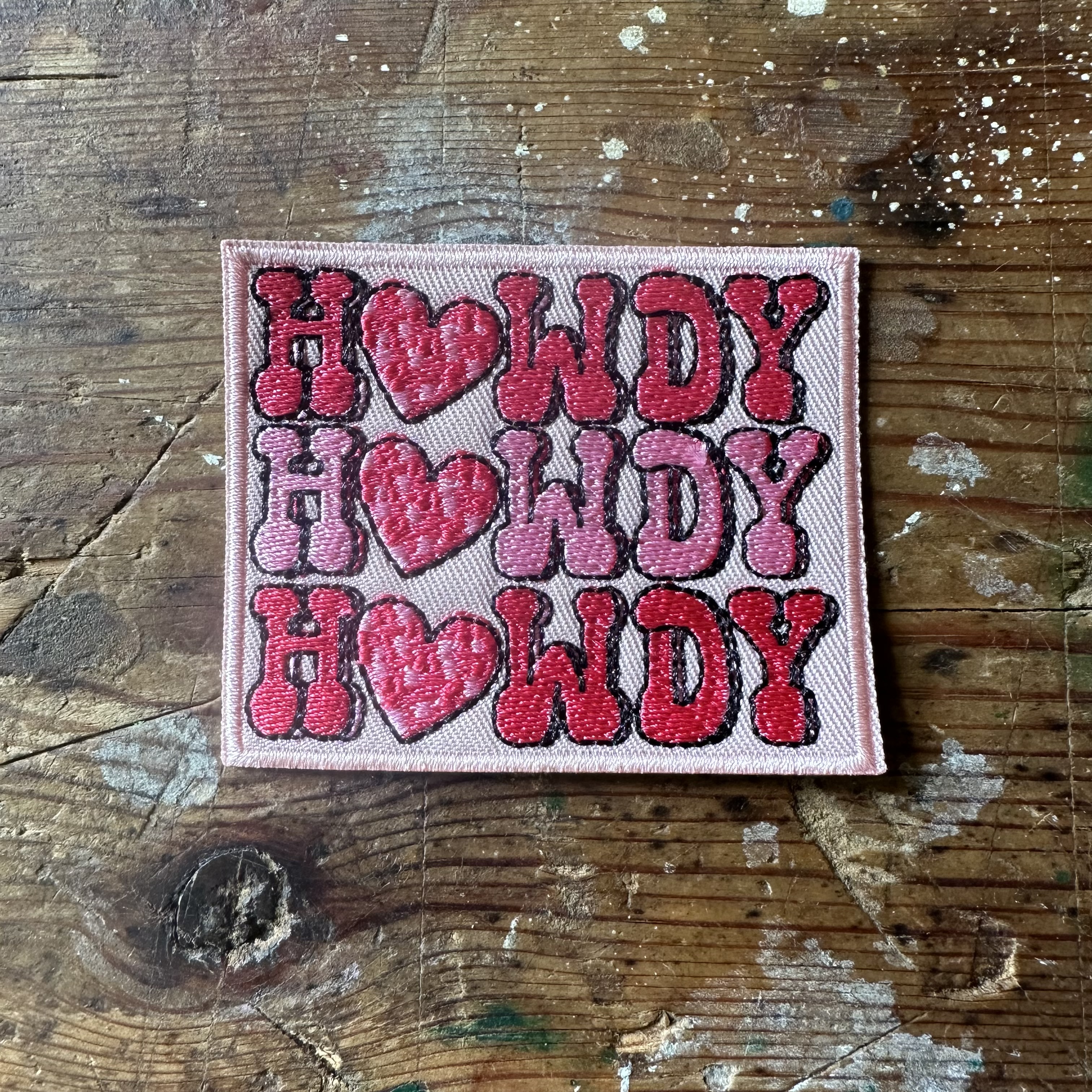 Tygmärke Howdy 