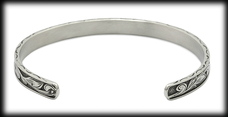 Vackert, snirkligt armband i rostfritt stål. - 3