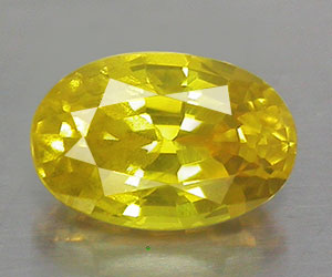 0.67 ct tjusig 6.4 mm oval naturlig kanarie gul safir ädelsten